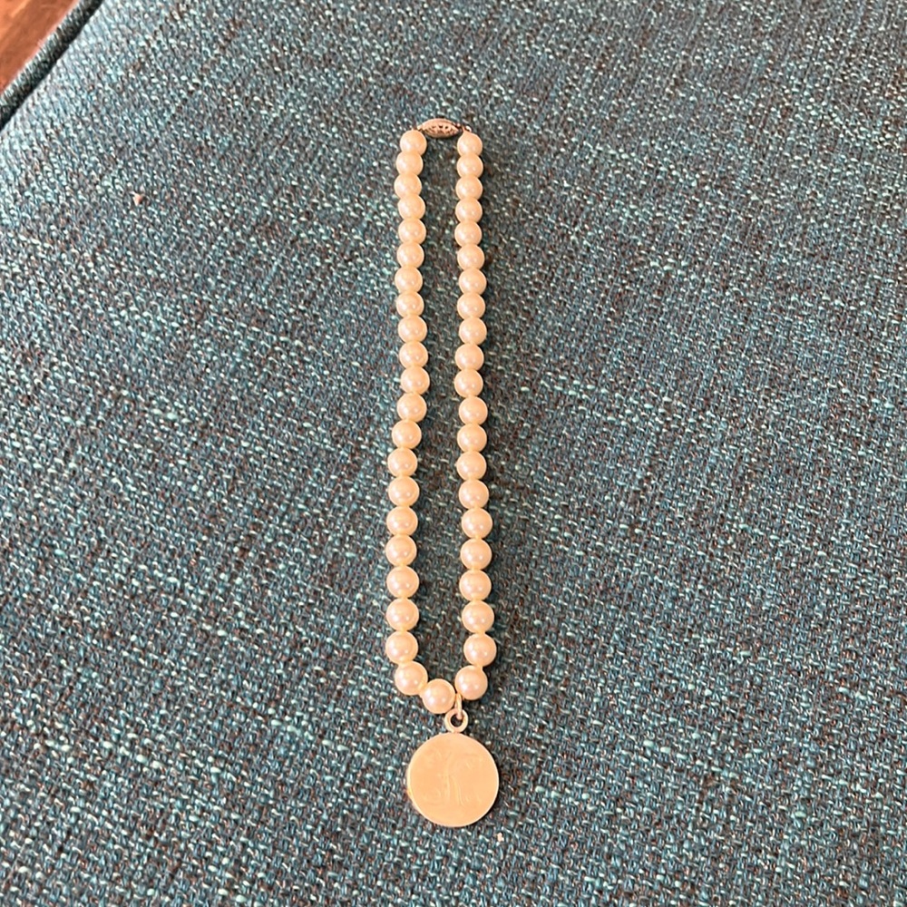 Monogram, sterling, silver, and pearl necklace with secure clasp